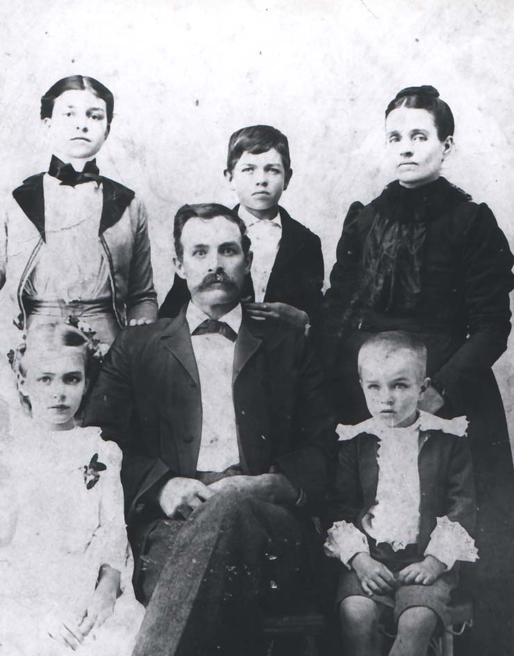 John Wesley Garrett's Family. From Left to right - back row: Bessie, Robert & Mary Ellen (Dalton) Garrett - seated: Emma, John Wesley Garrett, Roy. John Wesley Garrett (1855-1908), s/o Robert Henry Garrett and Angeline Barker. Mary Ellen Dalton (1858-1907), d/o W.P. & Elizabeth Dalton