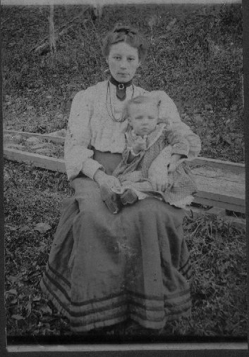 Ida (Caylor) Hoover, half sister of Samantha Gray (Hoover). Ida was born and buried in Estill County (1885-1963). Ida married John Will Hoover and they had 7 children. On her lap in the photo is her oldest son, Theodore Hoover (born 1903).