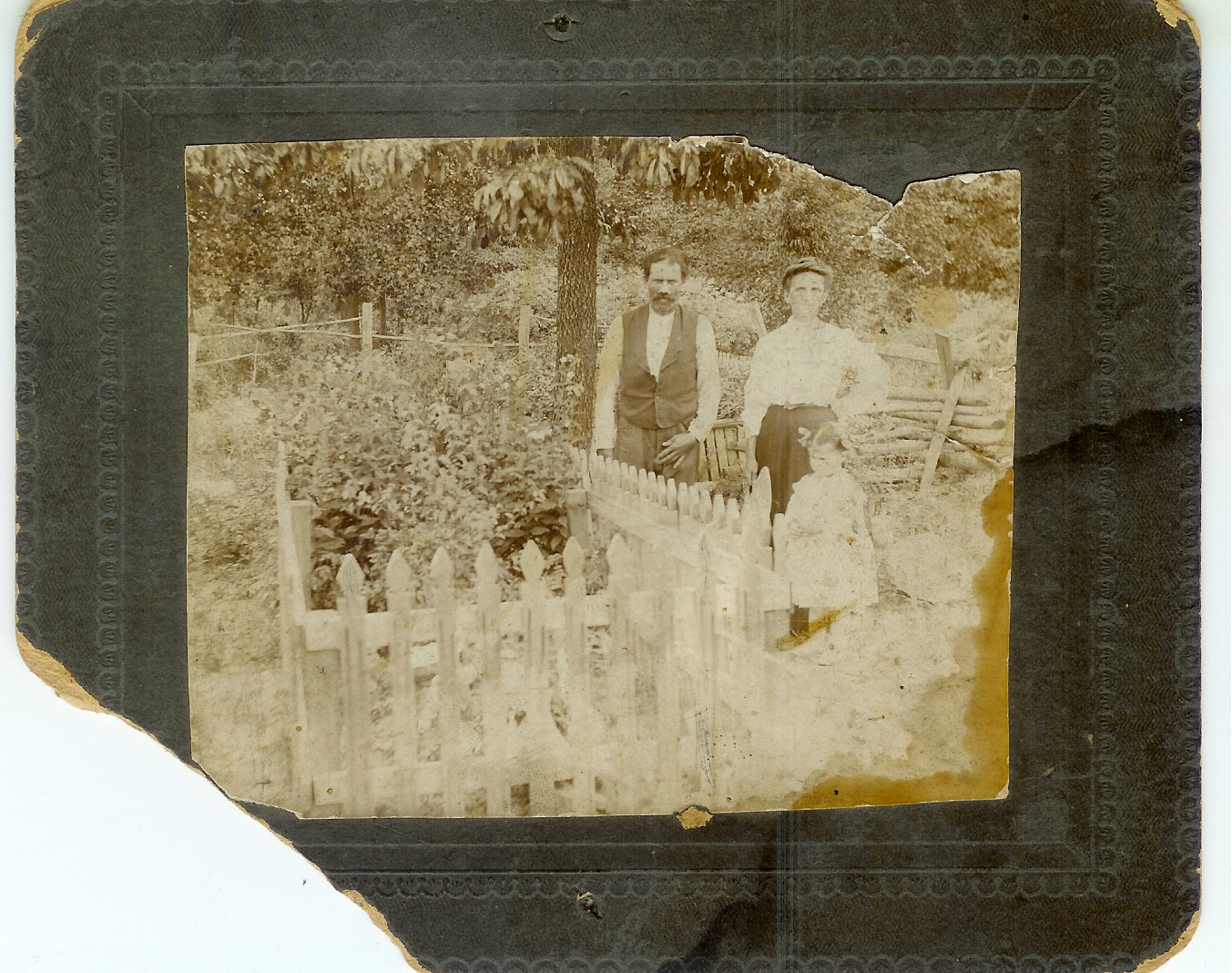 This is a picture of George Washington King, son of Samuel King & Malinda Riley Allen King, and Lucy Ann Puckett King, daughter of James Puckett & Malinda Jane Abney Puckett, with one of Joe King's daughters. Joe King was their son and he married Sally Ann Neal, both Joe & Sally Ann died leaving 4 small children.