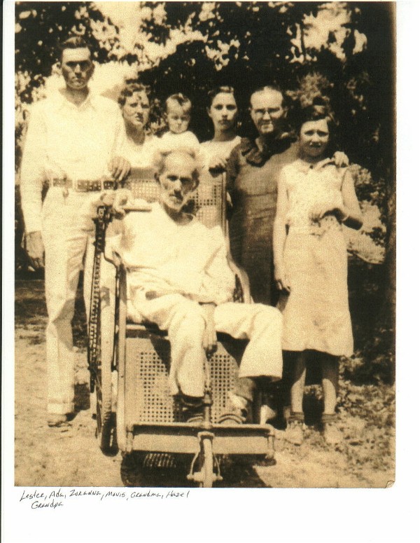 The man in the wheelchair is John William Patrick. On the back row from left is his son, Lester Patrick, Ada (Hobbs) Patrick, Zoranna Patrick, Mavis Patrick, Anna Delitha (Barnes) Patrick and Hazel Richardson.