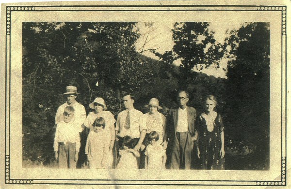 Walker Richardson, Glatha (Patrick) Richardson, Lloyd Patrick, Sylvia (Whiteman) Patrick, John William Patrick, and Unknown Lady, might be one of John's sisters. Can anyone identify her?