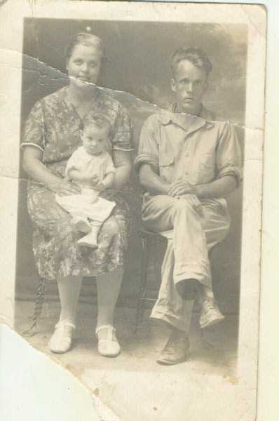 Harry and Rita (Rust) Walters, my grandparents, my mother in her lap