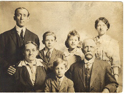 H.L. Wilson , (wife) Susan Marcum with son Gilbert, wife, & children