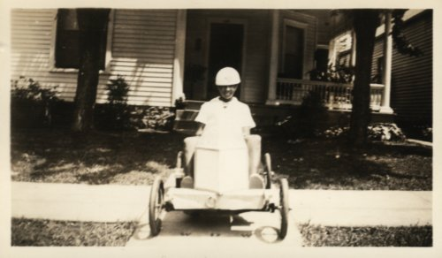african american boy in wooden racer